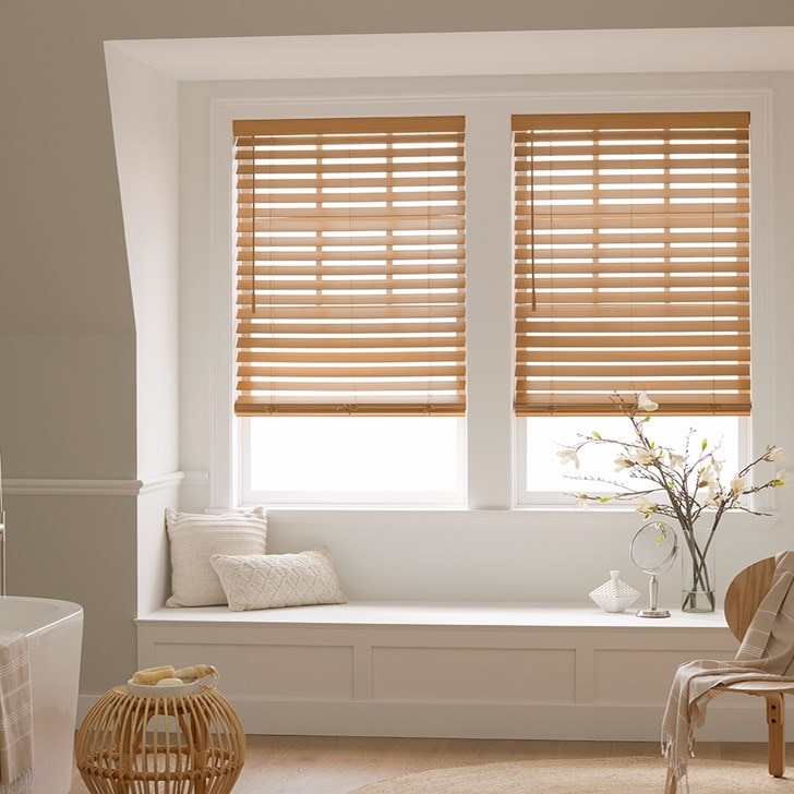 The Premium 2 1/2in. Faux Wood Blinds in the English Chestnut color with the 2 1/2in. Modern Valance.