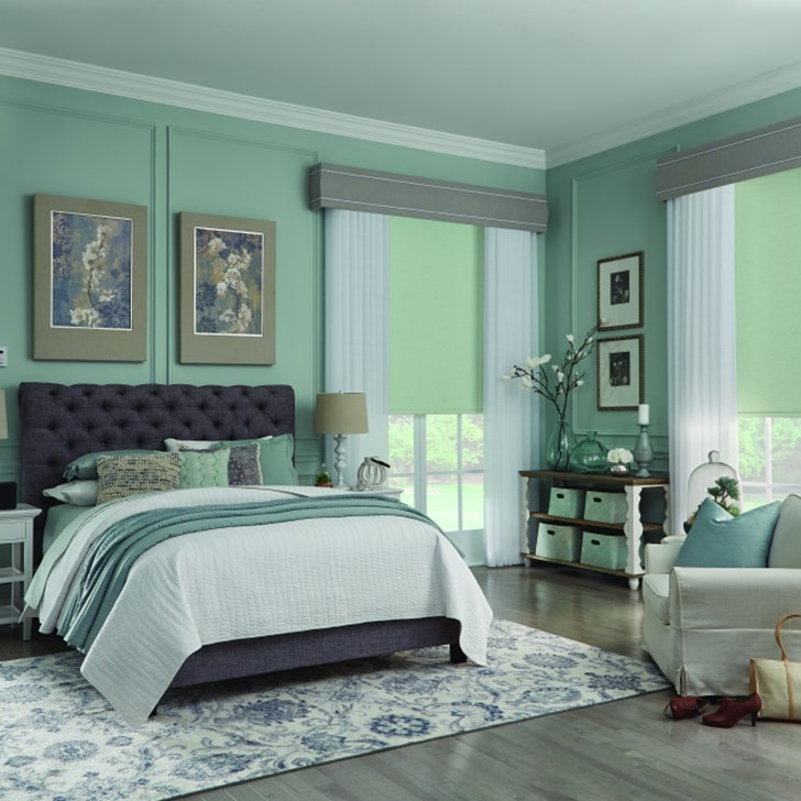 Roller Shade with Motorized Lift, Fabric-Wrapped Hem Bar: Kyoto, Spring Green 15906; Grommet Top Drapery: Toki, Sand Dollar 2781, and Curved Fabric-Wrapped Cornice: Tazewell, Sidewalk 6563, and White 3/8? Cord