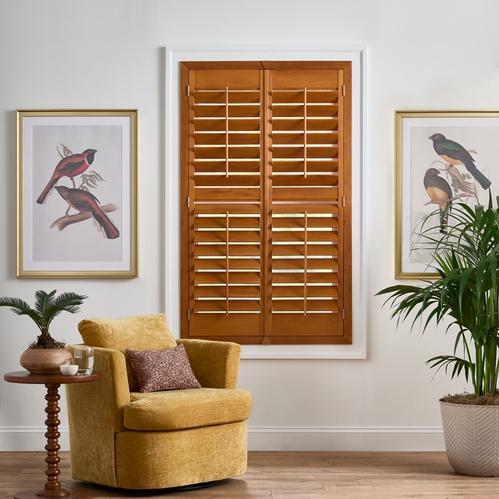 Color: Golden Oak; Frame: Z Overlap; Slats: 3.5 Inch Louver; Split: Divided in the Middle; Panels: Two Panel Split